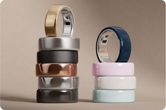 Person holding Oura ring