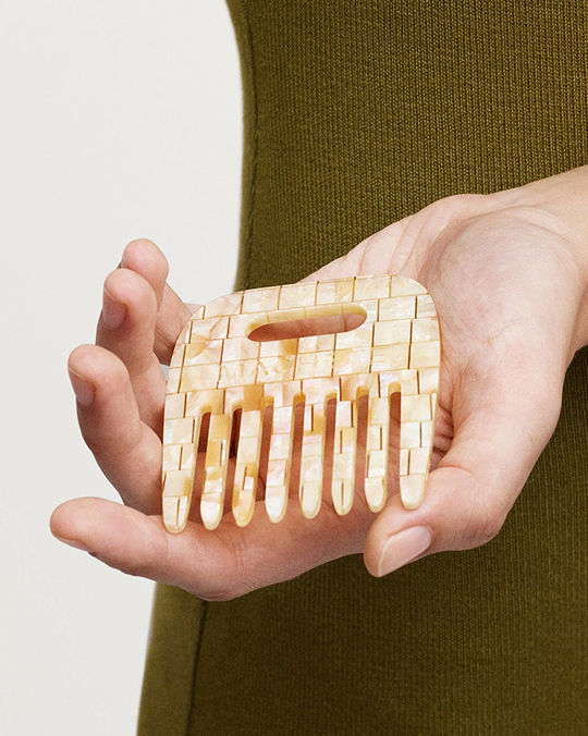 A wide-tooth comb to keep in your purse…