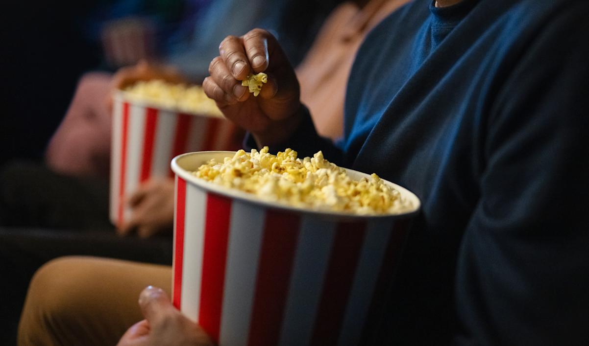 Person holding popcorn