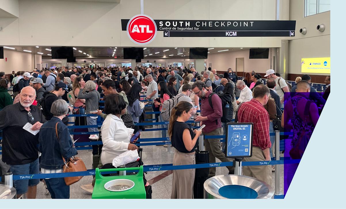 Atlanta airport travelers waiting in line for security.