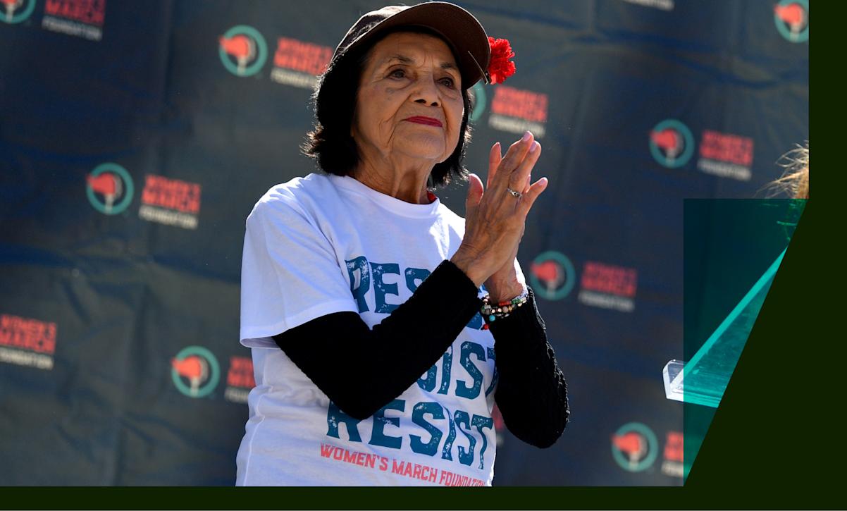 Activist Dolores Huerta speaks during the International Women's Day march