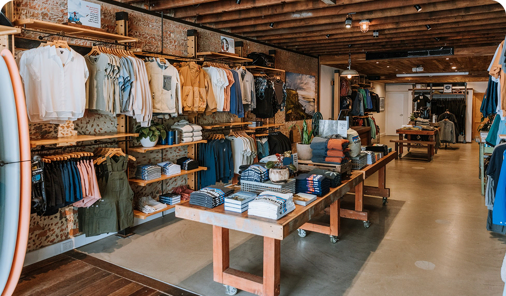An assortment of clothing inside a Patagonia retail store.