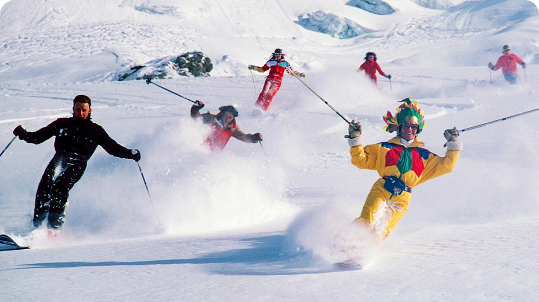 A person on skis dressed like a lamb.