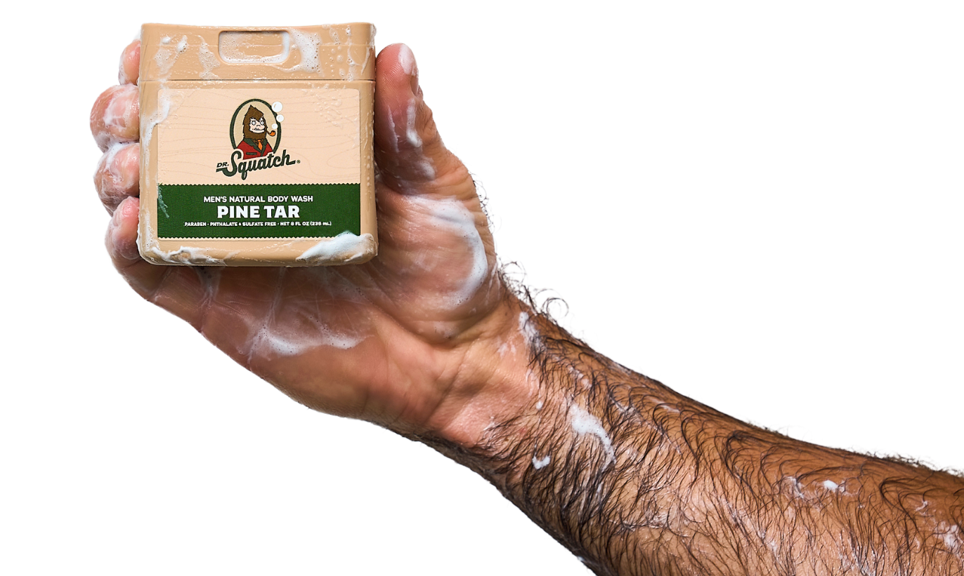 HAND HOLDING PINE TAR SOAP
