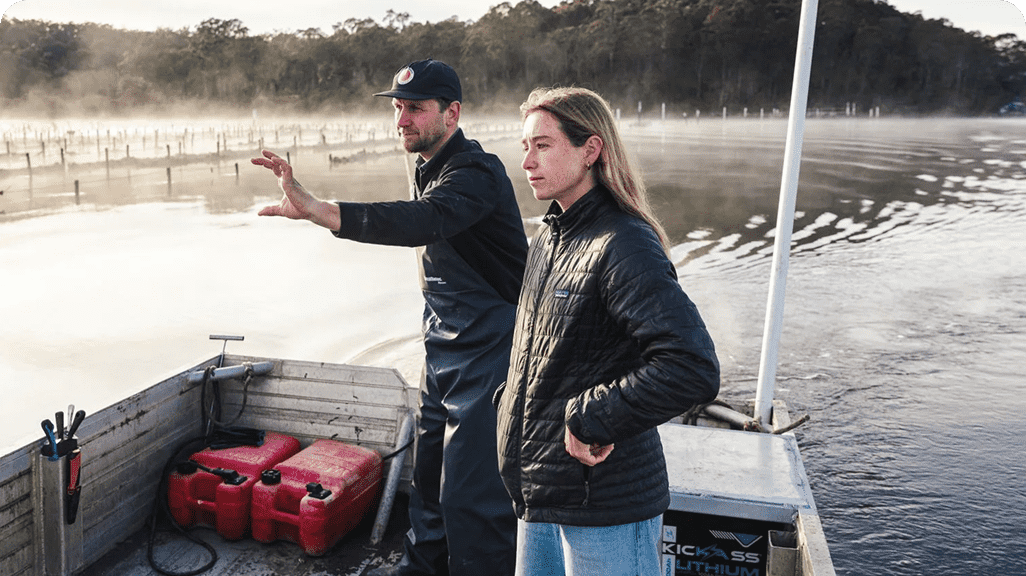Jase Finlay giving Tully White a morning tour of the Bhundoo's oyster farms